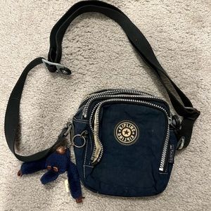 Navy Kipling cross body bag. Used, but good condition.